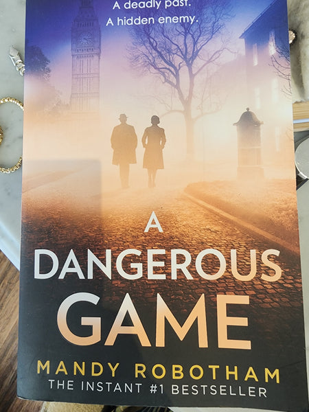 A dangerous game by Mandy Robotham