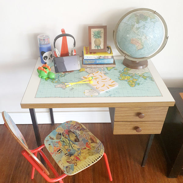 Vintage desk with world map